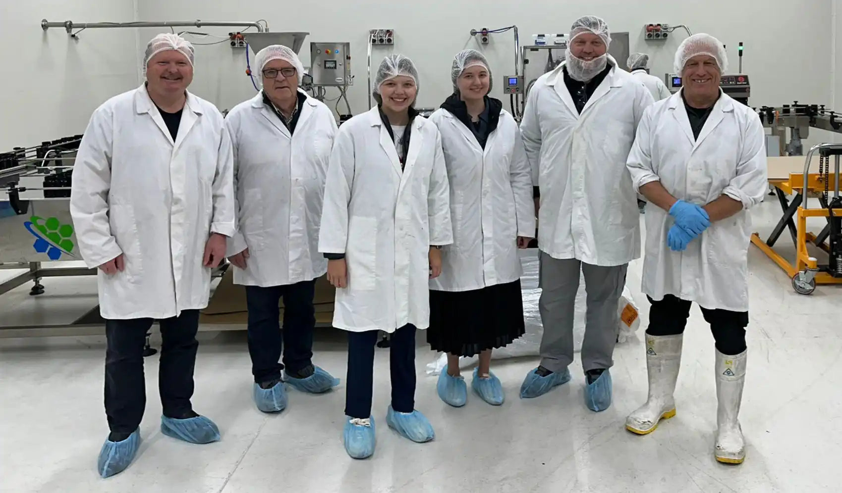 Group of people in lab coats.