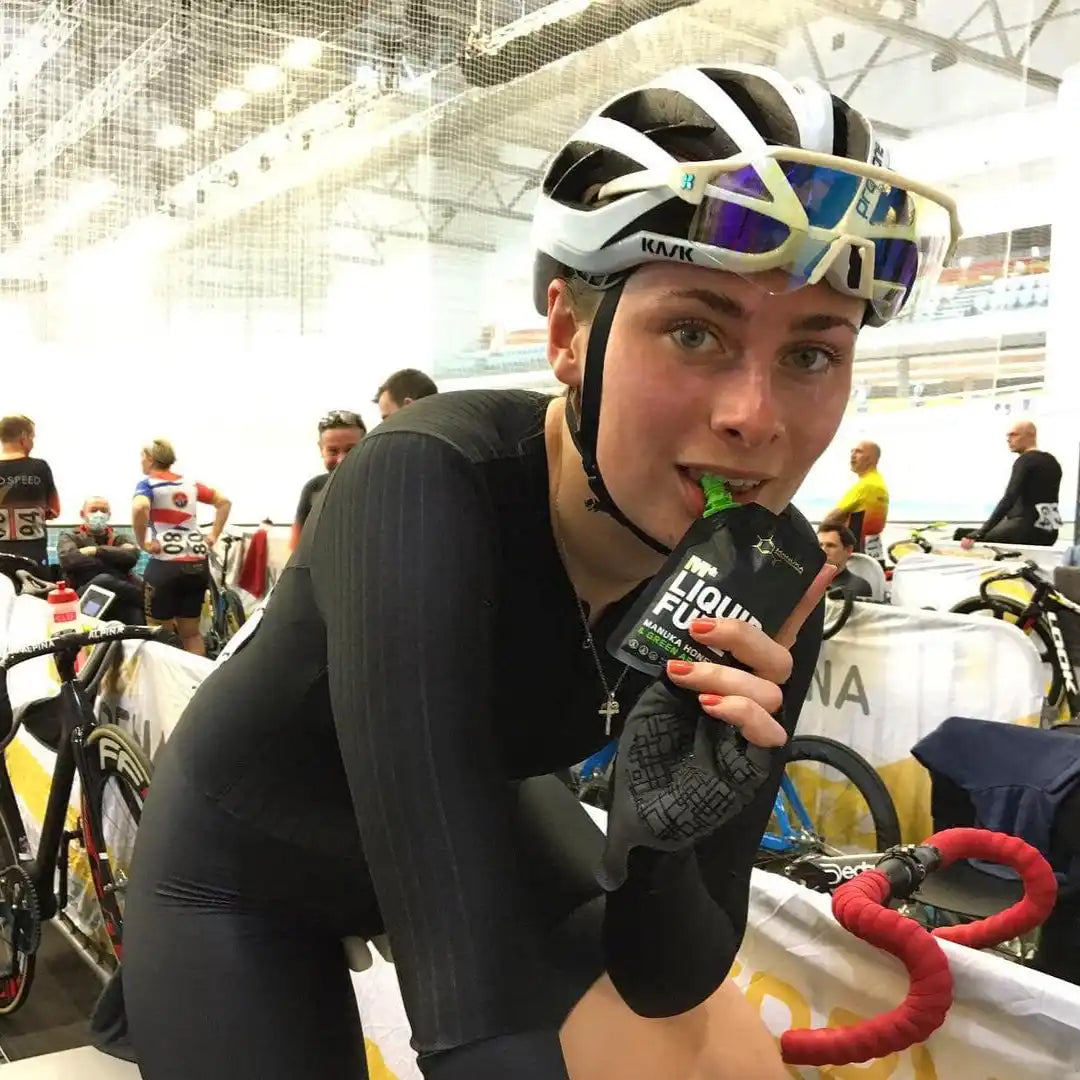 Cyclist consuming liquid fuel.