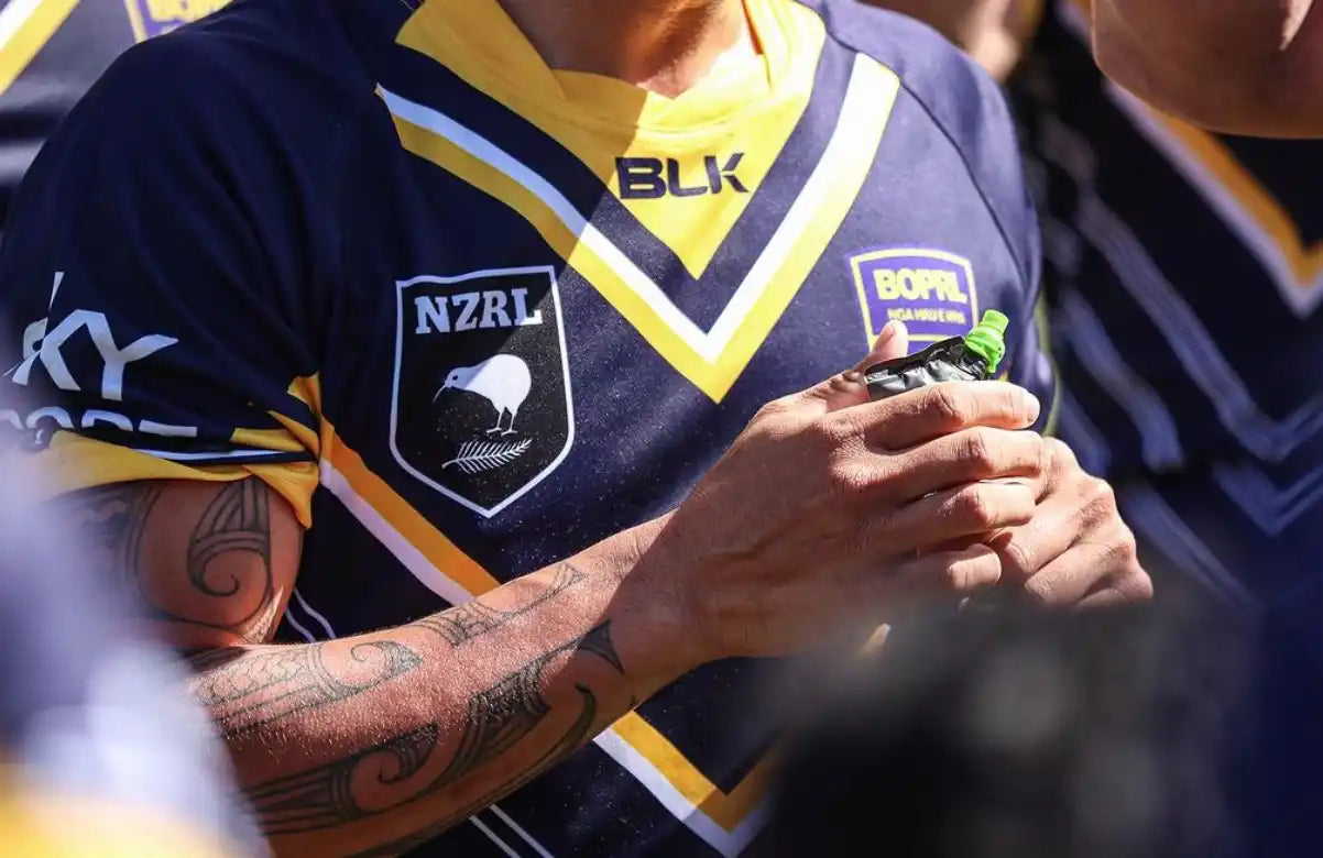 Navy and gold rugby jersey.